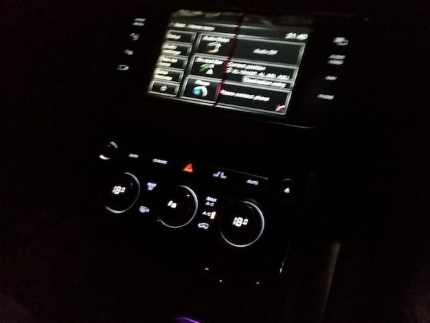 Close-up of the 2025 Jeep Gladiator's interior, highlighting the infotainment screen, comfortable seats, and well-organized controls.