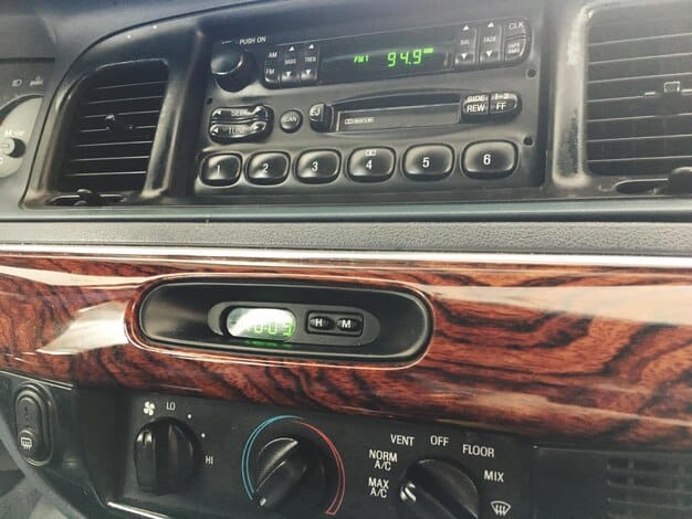 A close-up shot of the 2025 Toyota Tacoma's dashboard, highlighting the new 14-inch touchscreen, redesigned air vents, and updated steering wheel. Focus on the clarity of the screen and the tactile quality of the materials.