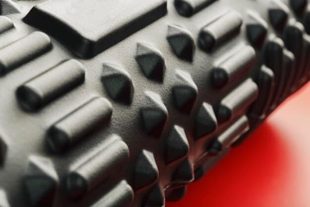 Close-up of the 2025 Nissan Frontier Pro-4X's Bilstein shock absorber, showcasing its rugged design and off-road capabilities. The image should highlight the branding and construction of the shock.