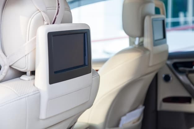 Interior view of the 2025 Chrysler Pacifica Hybrid, highlighting the spacious cabin, modern infotainment system, and comfortable seating arrangement. The image shows a family enjoying the ride, emphasizing the minivan's focus on passenger comfort and connectivity.