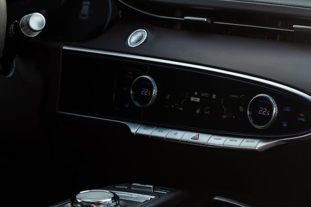 A close-up shot of the 2025 Mercedes-Benz S-Class's interior, focusing on the dashboard and center console. Highlight the premium leather stitching, wood trim, and the integrated MBUX infotainment system screen.