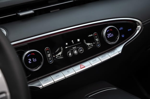 A close-up of the dashboard of the 2025 Audi A5 Coupe, highlighting the high-quality materials, the integrated infotainment screen, and the sleek design of the air vents.