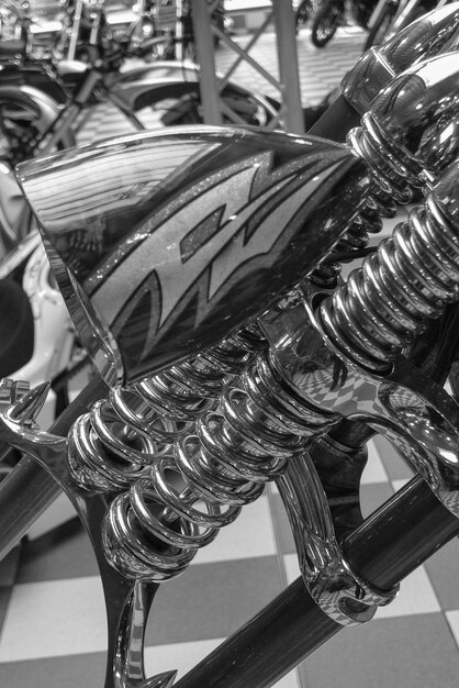Close-up of the 2025 Chevrolet Silverado's engine bay, showcasing the intricate details of the engine and its components. Focus is on the engine's size and robust design, emphasizing its power and capability.