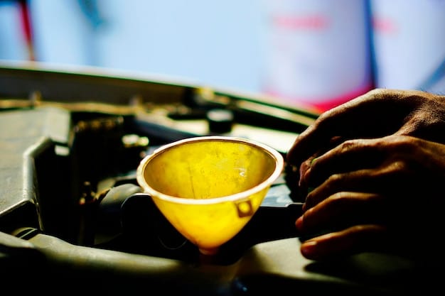 A close-up shot of a person checking the oil level in a car engine, using the dipstick. The engine is clean and well-maintained.