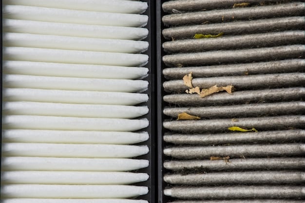 A car air filter, visibly dirty and clogged with debris, being held up against a clean, new air filter for comparison. The background shows the engine bay of a car.