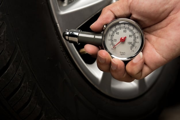 A person inspecting a car tire closely, using a tire tread depth gauge to measure the tread depth. The focus is on the gauge reading and the tire tread pattern.