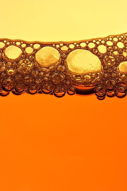A side-by-side comparison of conventional oil and synthetic oil under a microscope, showing the uniform molecule structure of synthetic oil versus the varied molecule structure of conventional oil.