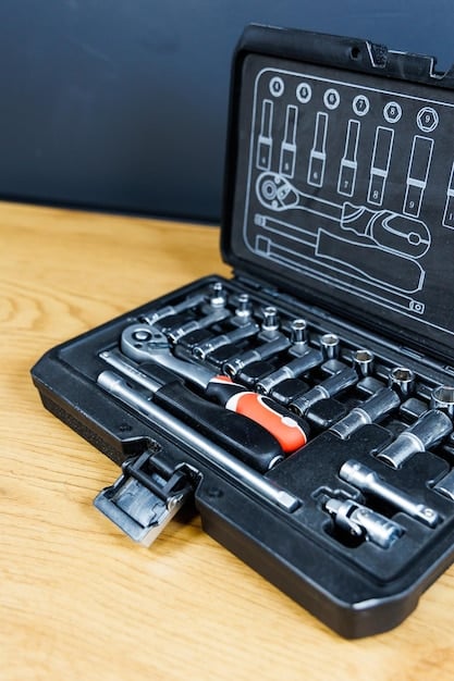 A detailed shot of various car diagnostic tools, including an OBD-II scanner, a multimeter, a socket set, and a set of wrenches, laid out neatly on a workbench.
