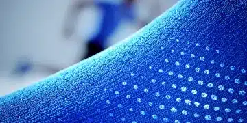Advanced athletic fabric with micro-perforations, showcasing innovation in performance apparel for 2026.