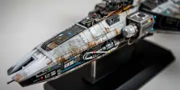 Futuristic spacecraft scale model, meticulously detailed and painted, embodying advanced model building techniques.